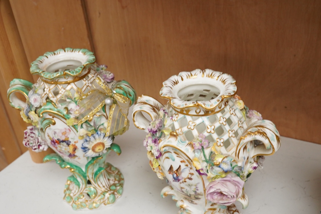 A near pair of English porcelain flower encrusted vases, c.1830, possibly Coalbrookdale, 21cm high